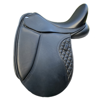Dual flap dressage saddle with moveable knee roll on velcro under a padded flap